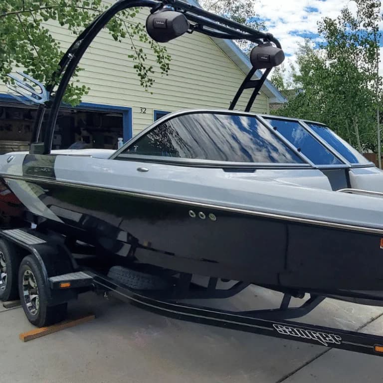 Boat window tint project on a trailer