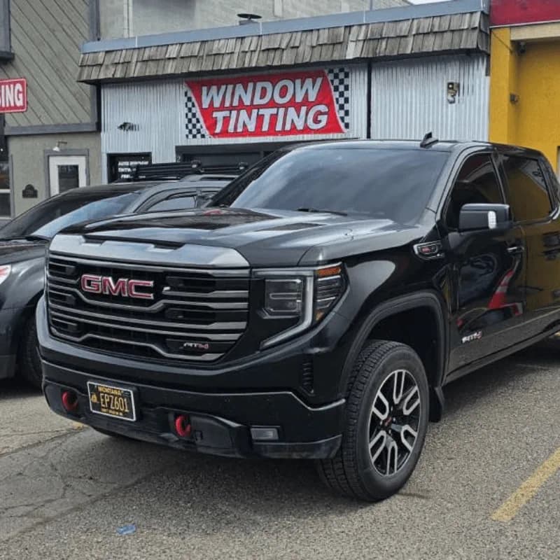 Black GMC truck with finished window tint