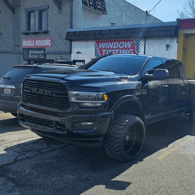Black Ram truck outside the storefront