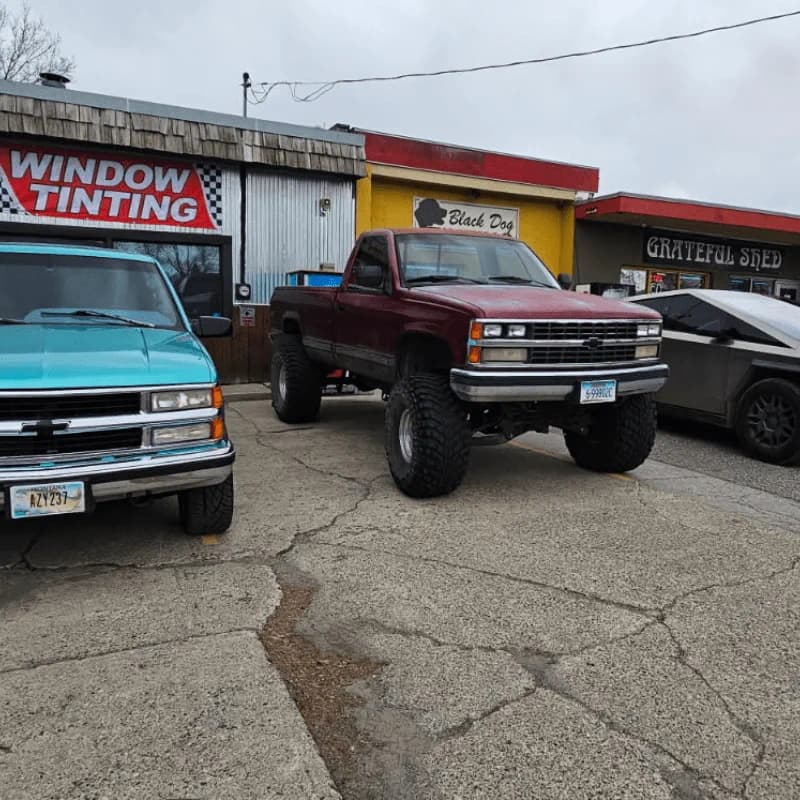 Classic pickup lineup outside Black Dog Tinting